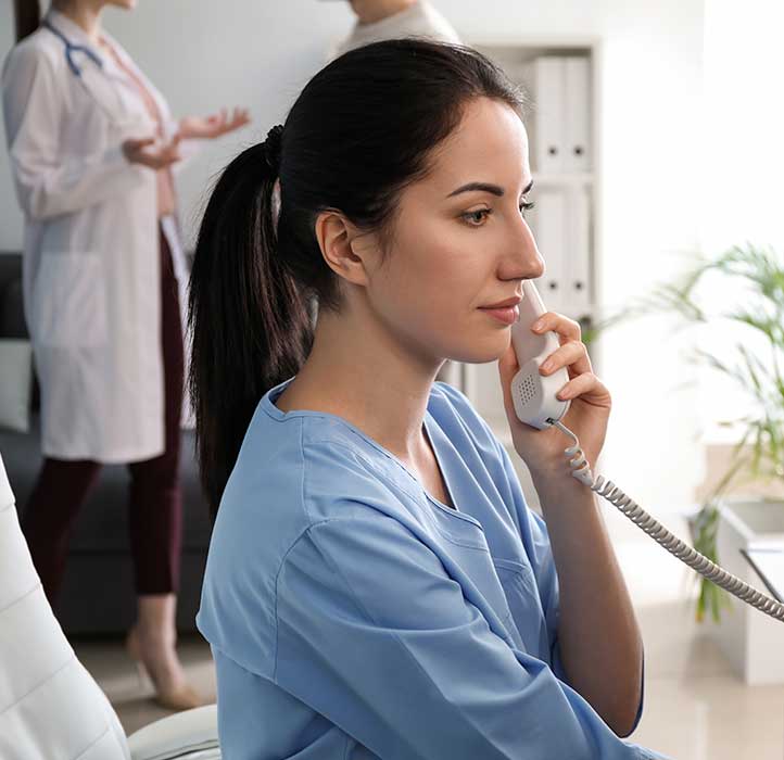 Healthcare Administrator on the phone